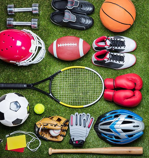 Various Sport Equipments On Grass